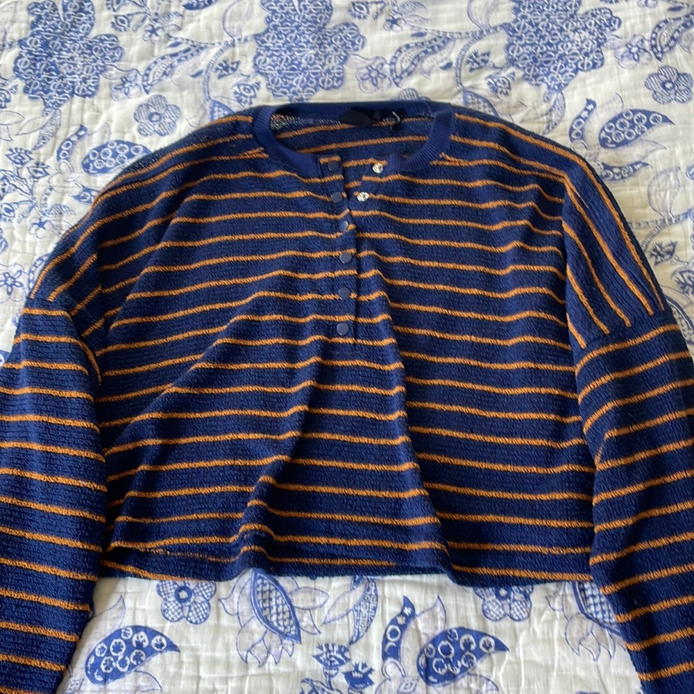 out from under Urban Outfitters button up shirt